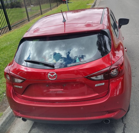 found-if-anyone-has-had-their-red-mazda-3-stolen-this-may-be-yours-big-0