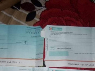 Found 4 cheques and 2 ATM card at Mangan