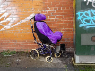 Found wheel chair on love lane l3 by Pearsons glass
